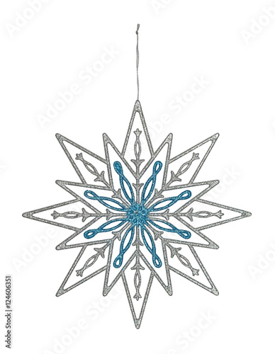 Graceful Christmas ornament, difficult brilliant snowflake. Isolated on a white background.