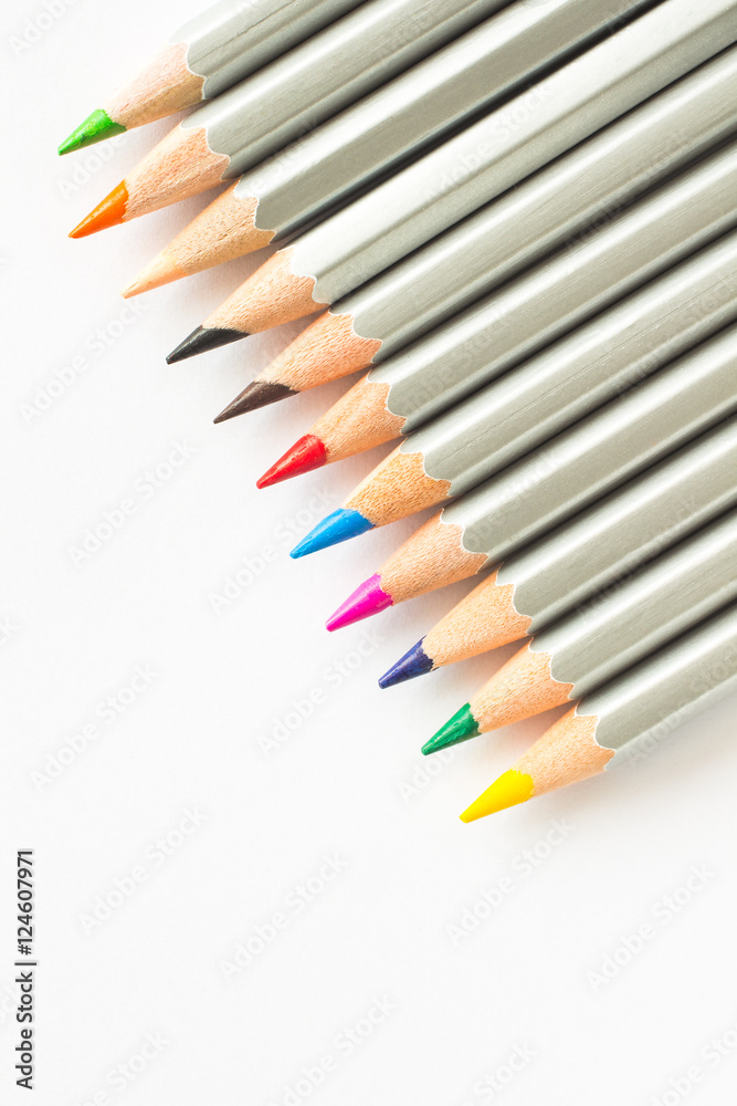Colored pencils on white background