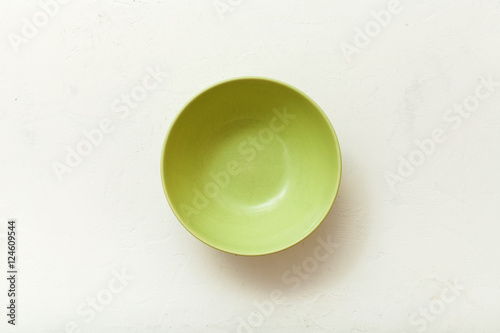 top view of green bowl on plastering plate
