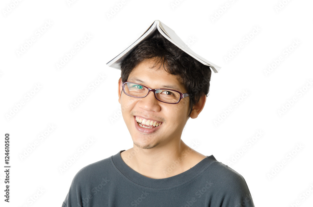 The man holding books on his head,isolated on white background The man holding books on his head,isolated on white background