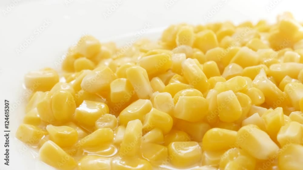 On plate served corn maize kernels from the can close-up 4K 2160p 30fps UHD footage - Canned healthy food sweet Zea mays background slow tilt 3840X2160 UltraHD tilting video On plate served corn maize kernels from the can close-up 4K 2160p 30fps UHD footage - Canned healthy food sweet Zea mays background slow tilt 3840X2160 UltraHD tilting video