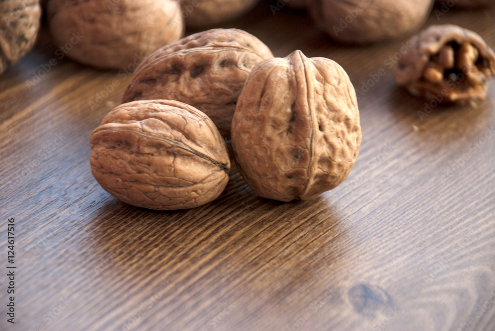 walnuts on the wooden-table. walnuts on the wooden-table.