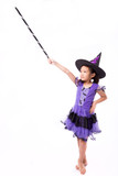 Little halloween witch girl costume isolated on white background