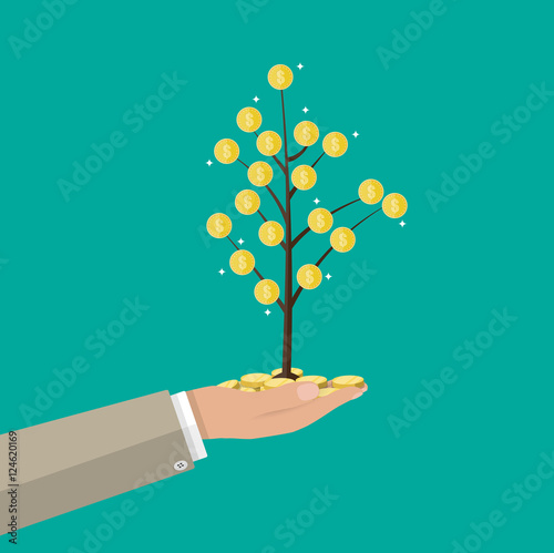 Businessman hand holding coin tree.