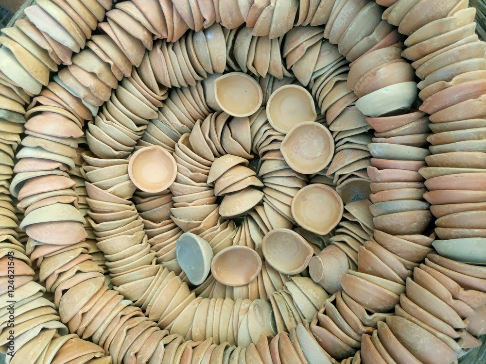 Obraz premium Diya, Indian oil lamps in baked clay used at Diwali