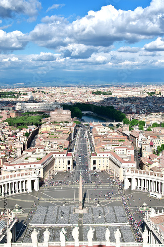 A view of Rome from the bell tower of the St. Peter's Basilica . Under cloudy skies the city spread, visible Castel Sant'Angelo and Piazza San Pietro.