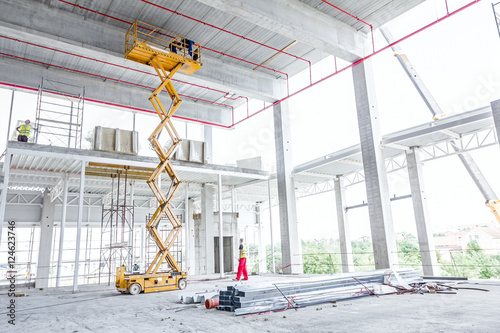 Scissor lift platform on a construction site