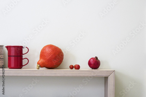 Still Life Autumn Decorations Behind a White Wall