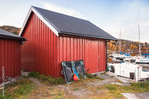 Norwegian red wooden barns photo