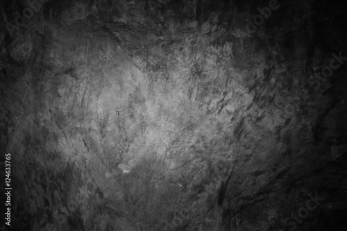 Dark concrete wall background, old grungy texture. © peterkai