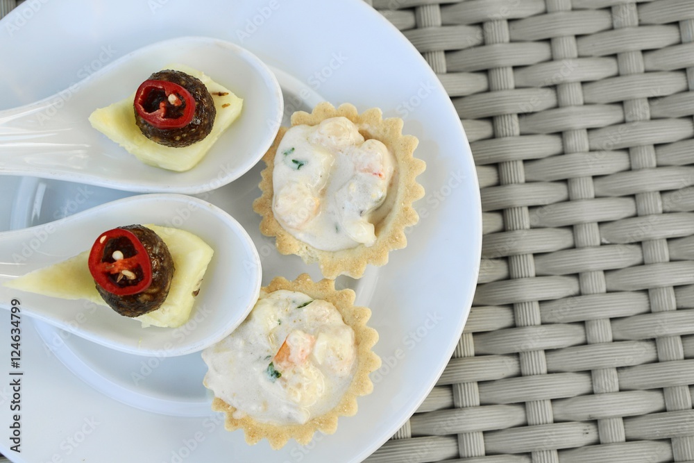 appetizer in white dish - soft and select focus evening nature light appetizer in white dish - soft and select focus evening nature light