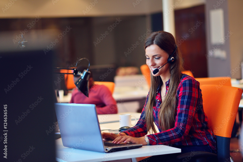 Successful business woman working at the office Successful business woman working at the office