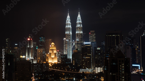 Night cityscape of Kuala Lumpur with famous Petronas Twin Towers  Malaysia