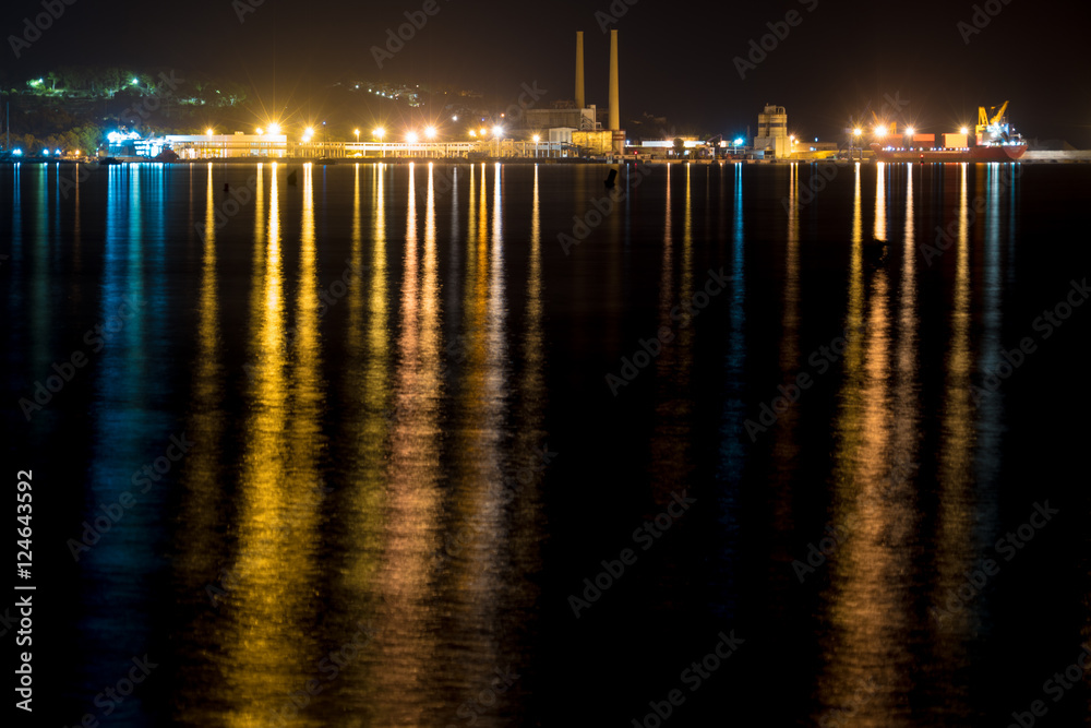 city reflection on night sea