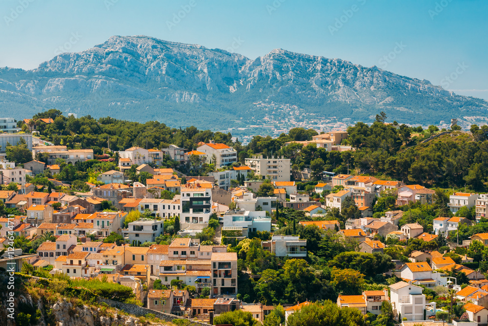 Urban scenic view, cityscape of Marseille, France. Sunny with bright blue sky.