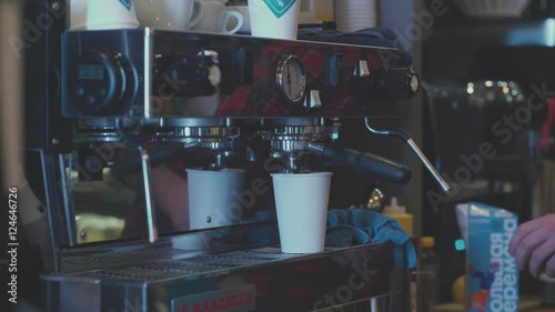 Wallpaper Mural Plastic cup of coffee. Steel coffee machine. The rhythm of the city. Caffeine. Coffee house. Coffee is poured into a glass. Vivacity. Drug Barista prepares latte in take away cup. Torontodigital.ca