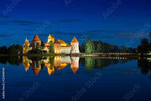 Trakai Castle at night - Island castle in Trakai isd one of the most popular touristic destinations in Lithuania, houses a museum and a cultural center. photo