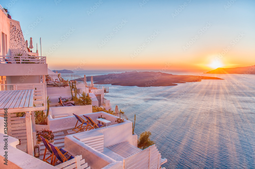 Naklejka premium Romantic Santorini island during sunset, Greece, Europe. Summer concept.