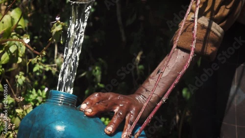 People getting fresh water from a river in africa