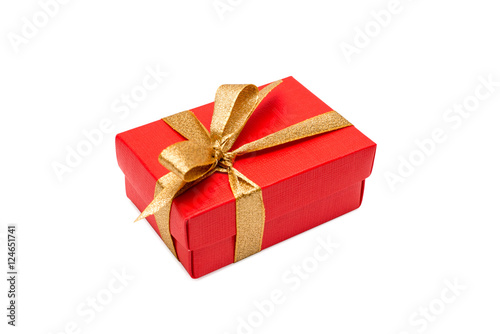 Red christmas gift box with a golden ribbon isolated on a white background. Clipping path