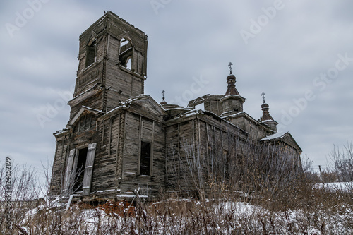 An old abandoned wooden Church of the Intercession of the Holy Virgin in Kamenka, Kursk region. in Russia photo