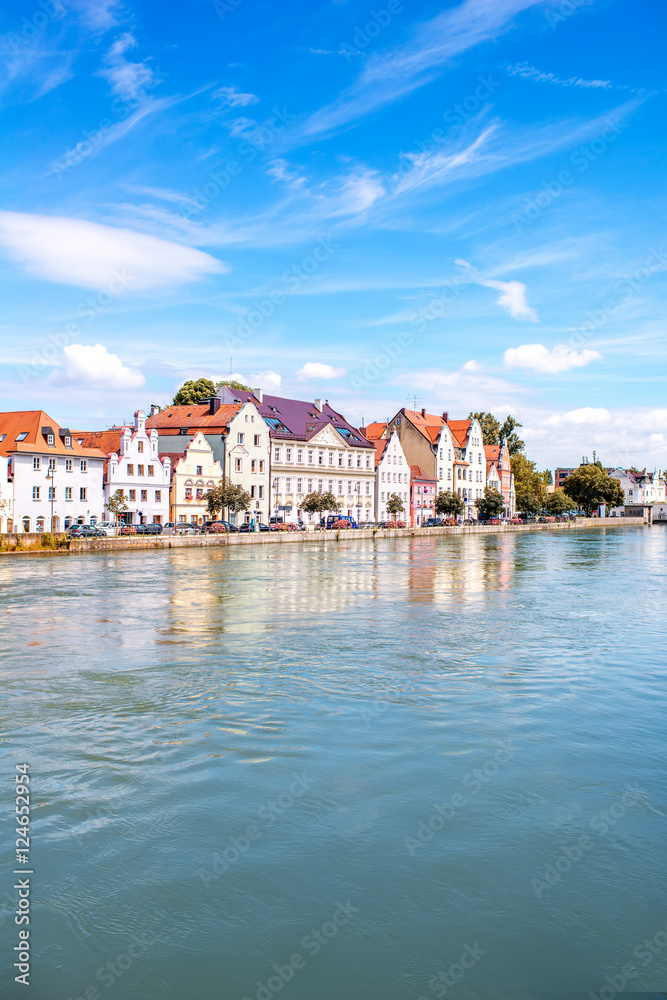 View on the riverside with beautiful buildings in Landshut town in Germany