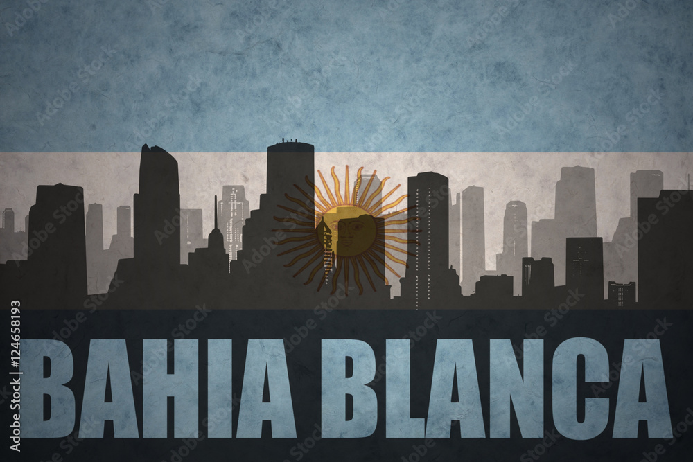 abstract silhouette of the city with text Bahia Blanca at the vintage argentinean flag