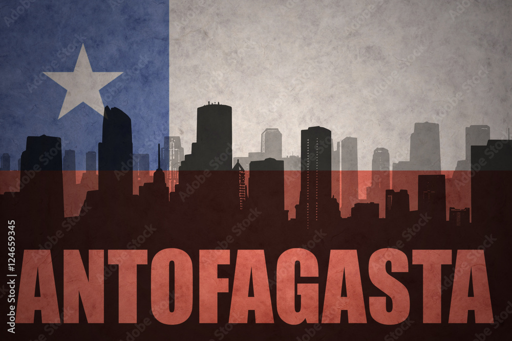 abstract silhouette of the city with text Antofagasta at the vintage chilean flag