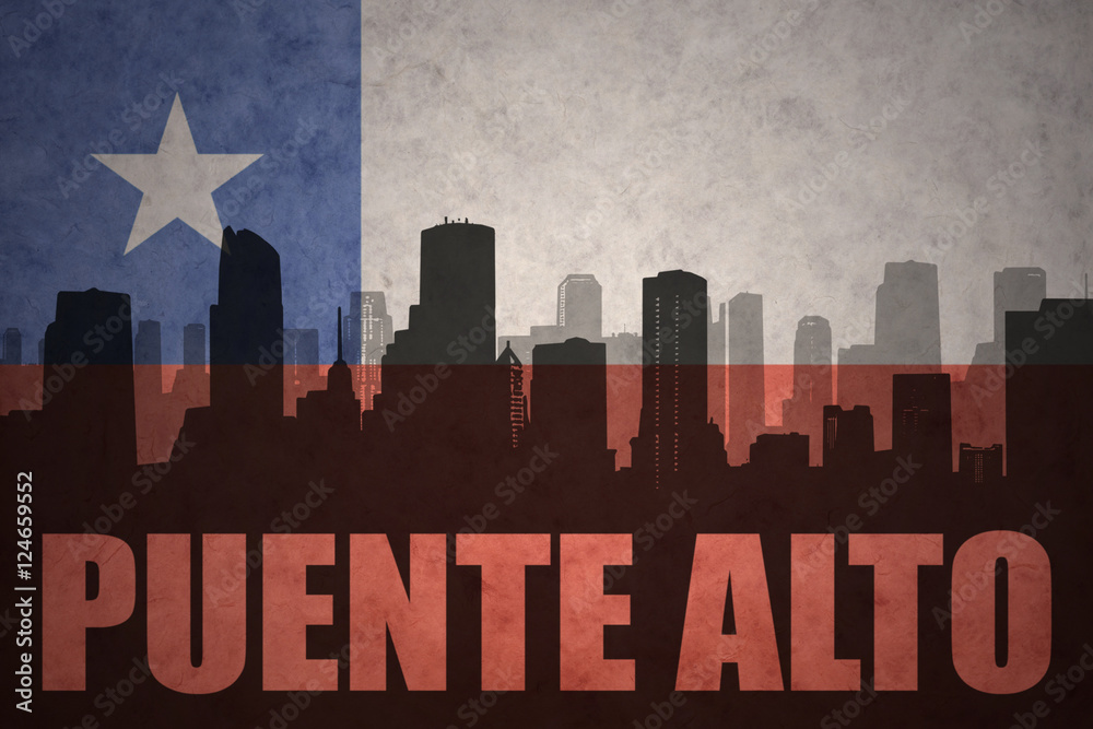 abstract silhouette of the city with text Puente Alto at the vintage chilean flag