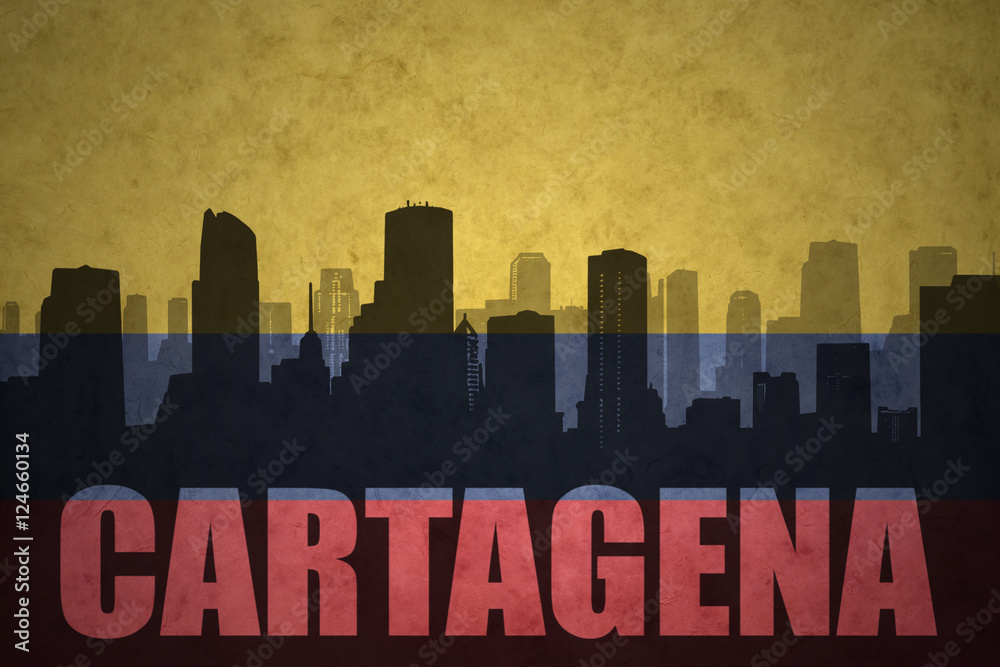 abstract silhouette of the city with text Cartagena at the vintage colombian flag