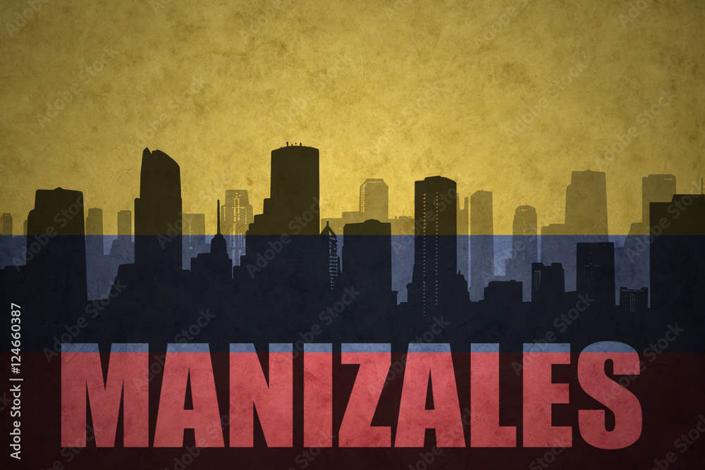 abstract silhouette of the city with text Manizales at the vintage colombian flag