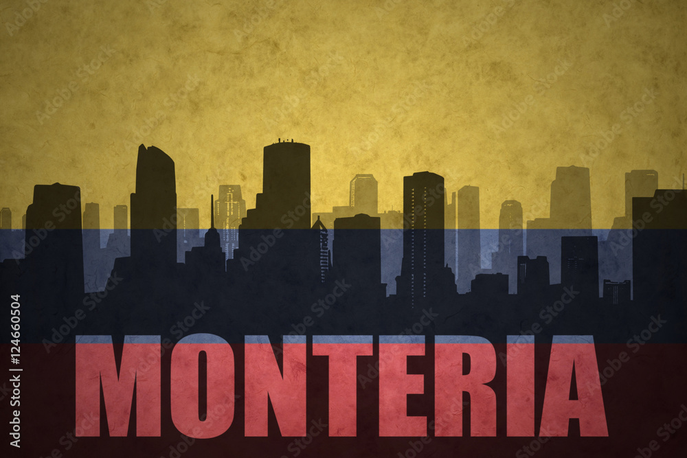 abstract silhouette of the city with text Monteria at the vintage colombian flag