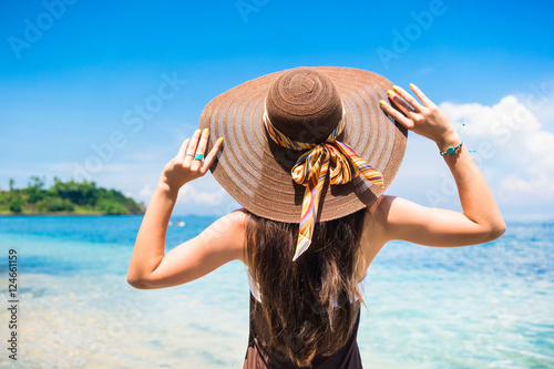 Photography Woman enjoying the view at the beach or ocean