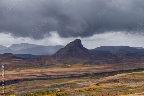 View on a Iceland mountain under strong cloud