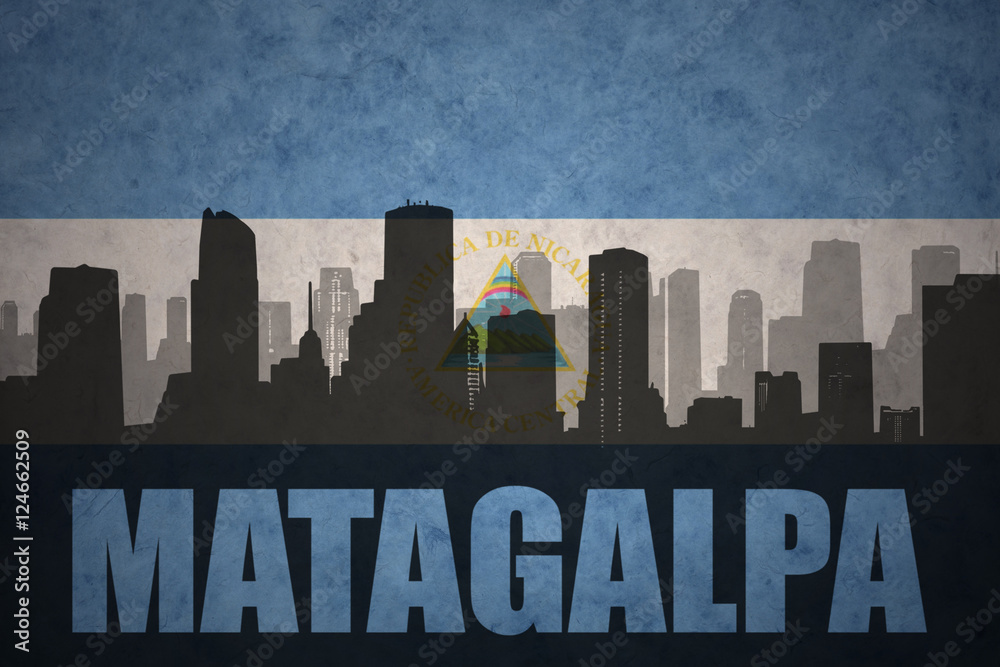 abstract silhouette of the city with text Matagalpa at the vintage nicaraguan flag