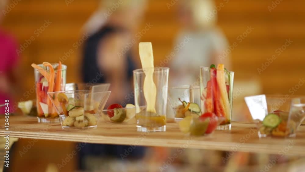 Various snacks on a buffet table at the event, the camera moves smoothly. Various snacks on a buffet table at the event, the camera moves smoothly.