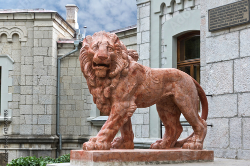 Terracotta lion on the porch of the main entrance of the Yusupov Palace. photo