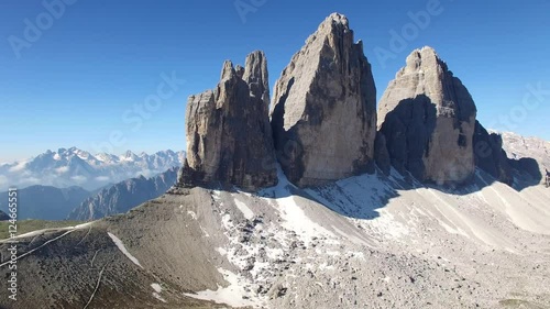 AERIAL VIEW: flight over National Park Tre Cime Di Lavaredo. Italian Dolomite