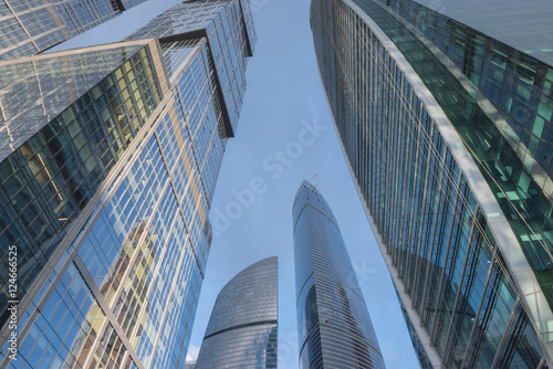 Bottom view of modern skyscrapers in business district in morning