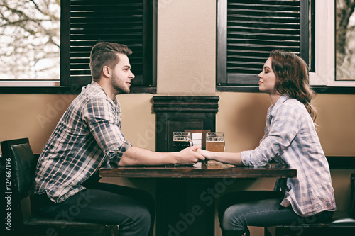 Happy young couple on date ...