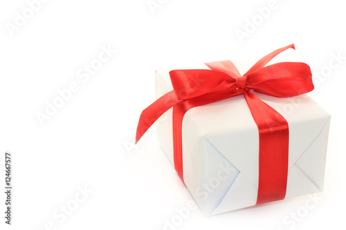 white gift box with bow over white