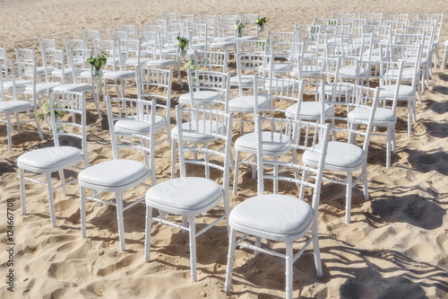 Fototapeta Naklejka Na Ścianę i Meble -  Chairs in a row for the wedding ceremony.