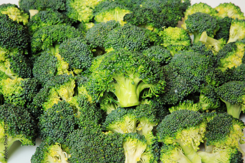 Macro closeup of green vegetables: cut broccoli. Broccoli texture closeup for any ideas. Fresh vegetables concept.