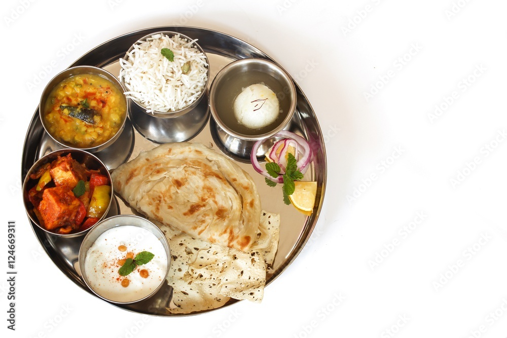 Indian vegetarian Thali isolated on white, top down view