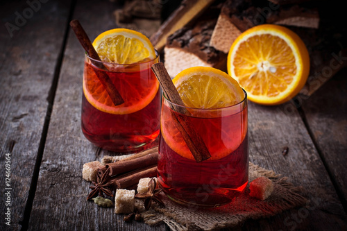Glasses of mulled wine with orange and cinnamon