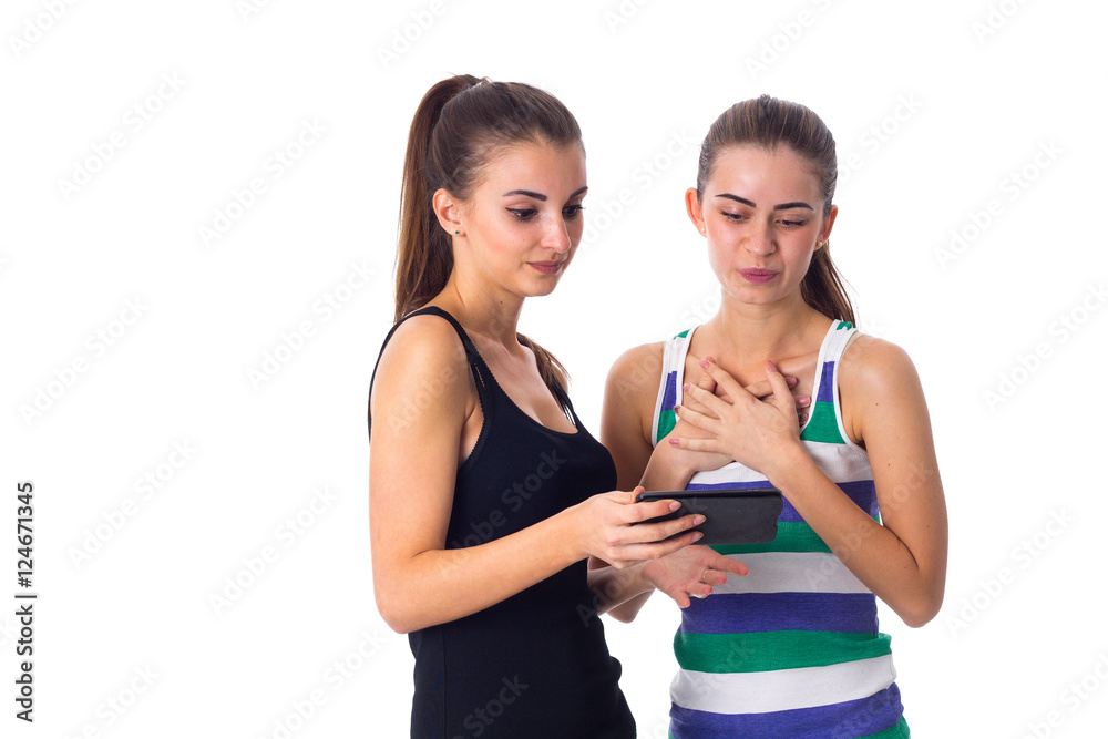 Two young women using smartphone Two young women using smartphone