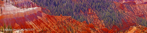 Panorama, fantasticly eroded red Navajo sandstone pinnacles photo