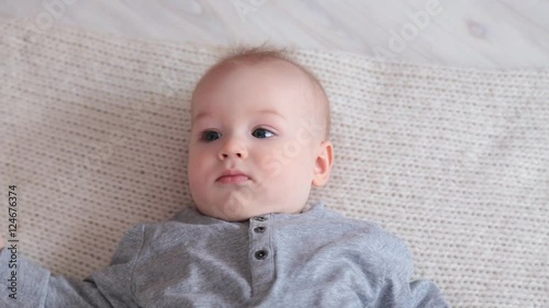 Pretty baby is lying