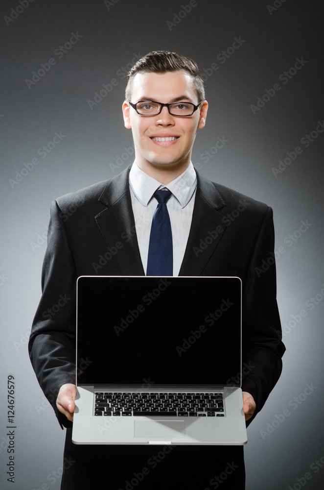 Man with laptop in business concept