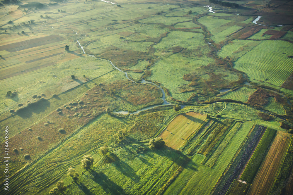 Sunrise over Poland. Beautiful fields and river landscape.